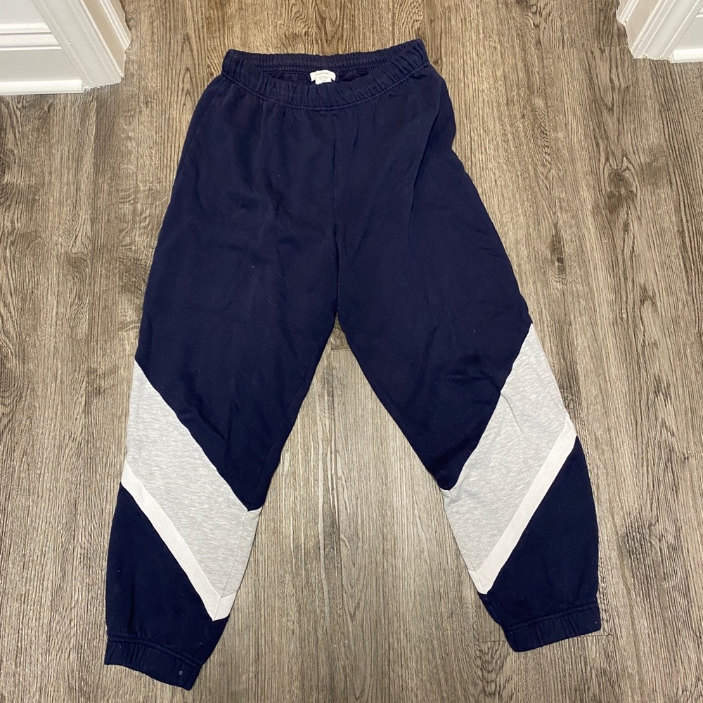 Navy joggers with diagonal stripe design